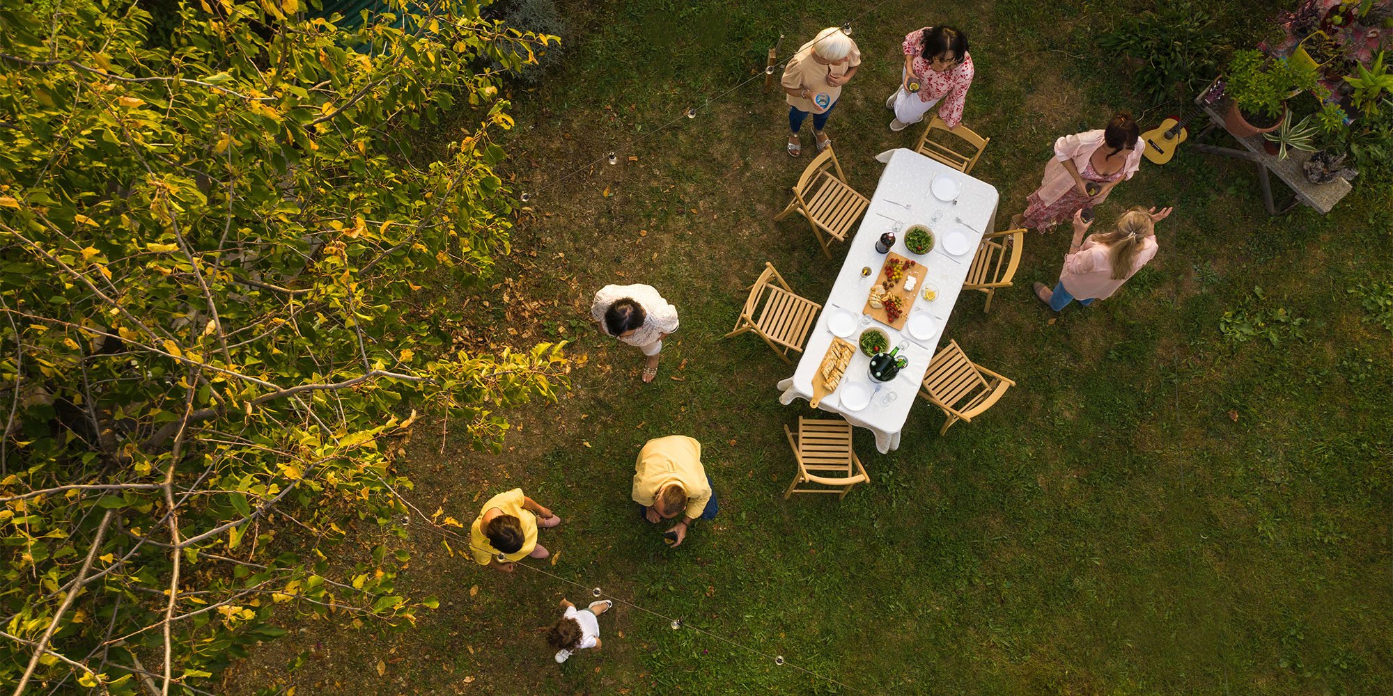 Aerial view of family on birthday party at backyard