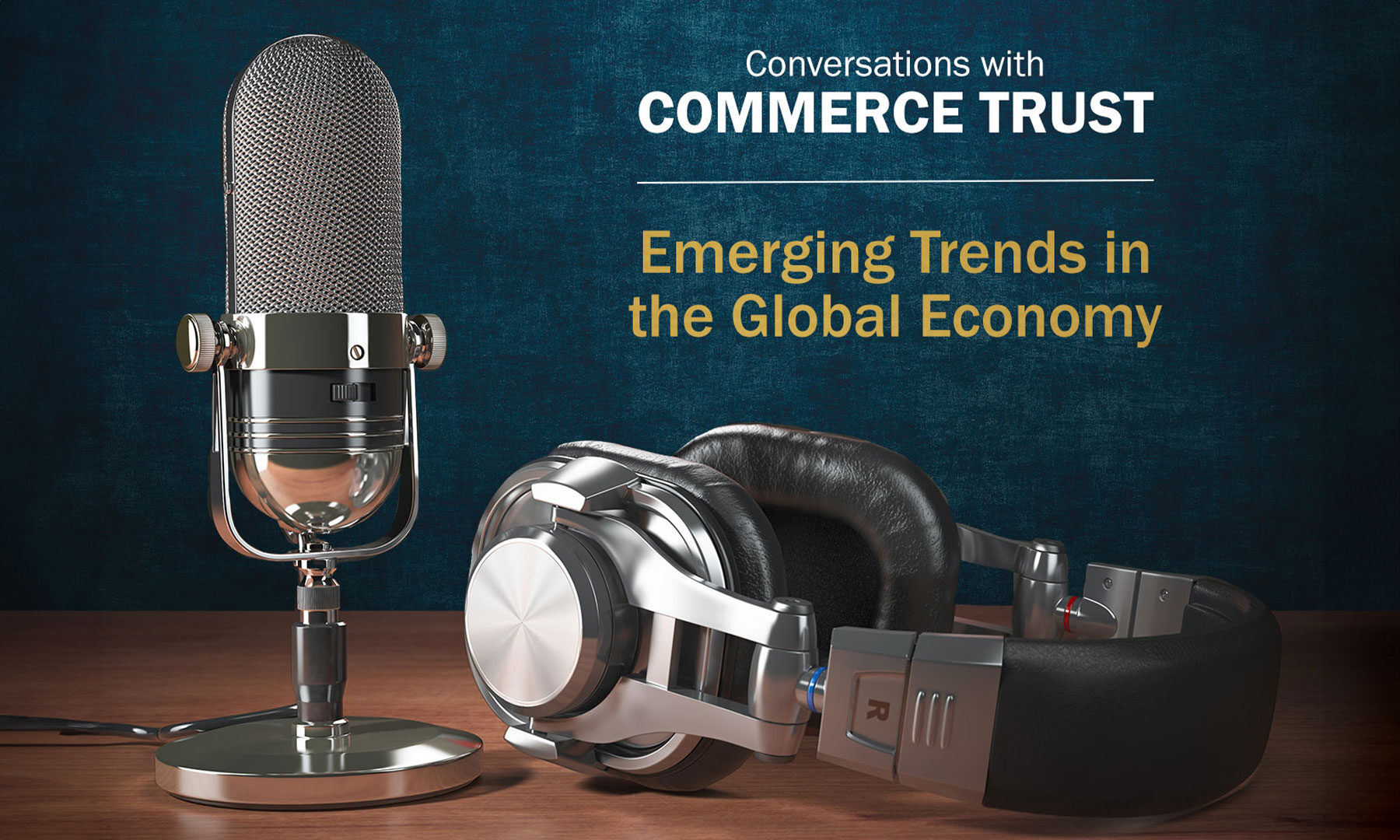 Podcast microphone headphones wood table navy background Conversations With Commerce Trust Emerging Trends in the Global Economy