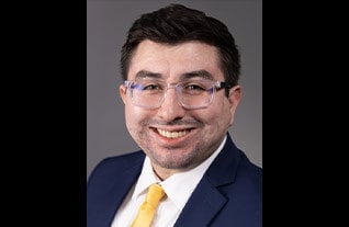 Headshot of Commerce Trust's Sergio Tekeli.